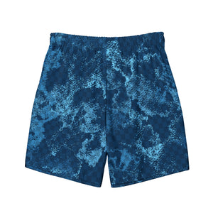 Introducing Crank Style's Men's Dirty Blue Swim Trunks, the perfect companion for a sizzling summer day. These trunks are designed to be quick-drying and breathable, featuring multiple pockets to keep your belongings secure and a silky, anti-chafe inner liner for ultimate comfort. Don't miss out on these must-have swim trunks!