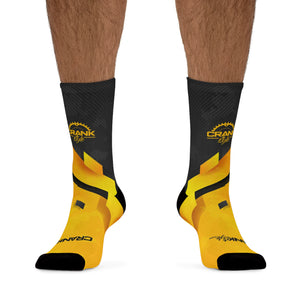 Introducing Crank Style's Unisex MTB socks in Yellow & Grey Abstract Camo design. These soft, breathable, and stylish socks feature a proprietary blend of yarns and 200-needle knit construction. With cushioned bottoms for extra support, they offer a comfortable fit for sizes up to US size 12. These moisture-wicking socks are made with premium fabric composition and are perfect for fashionable mountain biking. Complete your look with matching jerseys. Shop now for trendy and functional MTB socks.