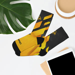 Introducing Crank Style's Unisex MTB socks in Yellow & Grey Abstract Camo design. These soft, breathable, and stylish socks feature a proprietary blend of yarns and 200-needle knit construction. With cushioned bottoms for extra support, they offer a comfortable fit for sizes up to US size 12. These moisture-wicking socks are made with premium fabric composition and are perfect for fashionable mountain biking. Complete your look with matching jerseys. Shop now for trendy and functional MTB socks.