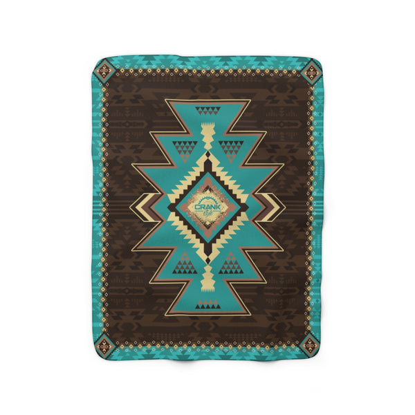 Crank Style's Super Cozy Southwest Style Sherpa fleece blanket. Turquoise and brown shades to complete this awesome blanket. Great for MTB events, holiday gifts or just curling up on the couch after shredding the trails. 