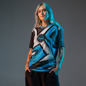 Crank Style's Blue, Grey, & Black Racing Style Check UPF50+ Unisex Mountain Bike Jersey  Looking for the perfect Mountain Bike jersey? We have you covered—made of 100% recycled polyester fabric; this shirt is breathable, moisture-wicking, and has a double-layered v-neck collar that creates a premium look.