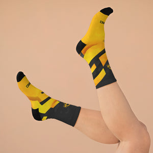 Introducing Crank Style's Unisex MTB socks in Yellow & Grey Abstract Camo design. These soft, breathable, and stylish socks feature a proprietary blend of yarns and 200-needle knit construction. With cushioned bottoms for extra support, they offer a comfortable fit for sizes up to US size 12. These moisture-wicking socks are made with premium fabric composition and are perfect for fashionable mountain biking. Complete your look with matching jerseys. Shop now for trendy and functional MTB socks.